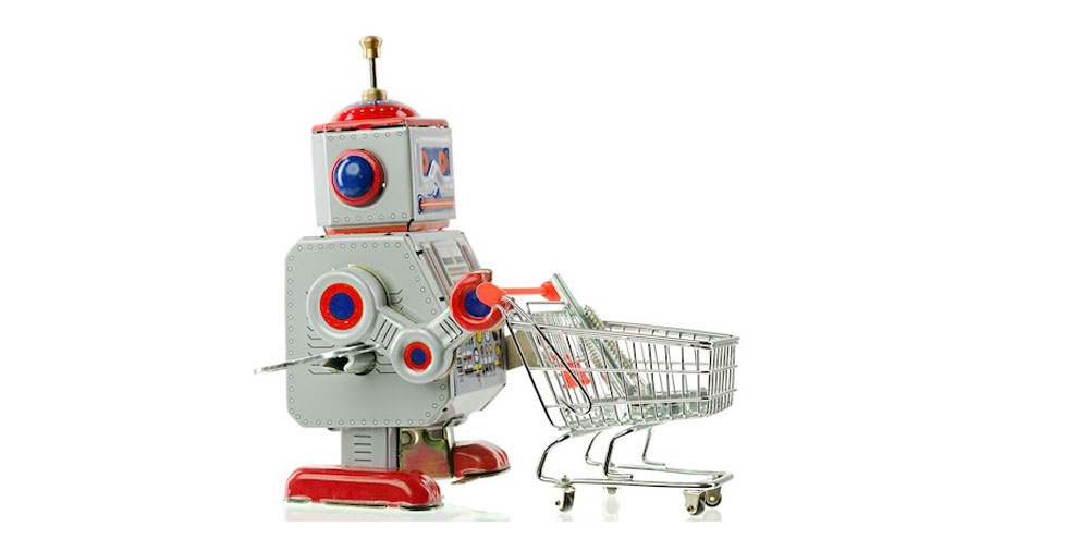 A robot pushing a shopping cart.