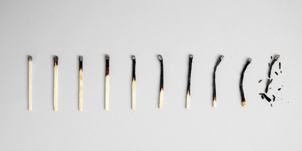 A line of matches burning out.